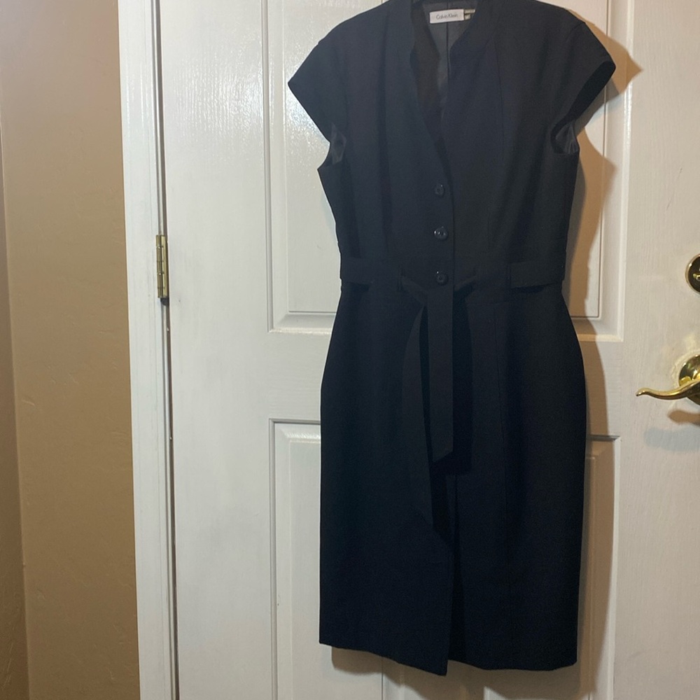 Calvin Klein button down up dress with belt. Color: Black Size: 10 runs small